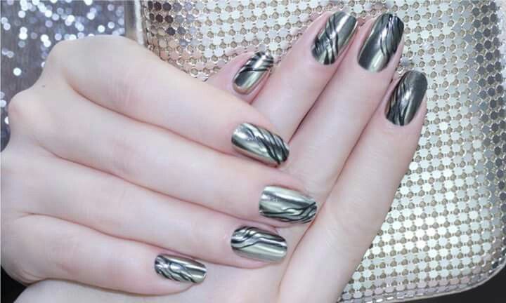 Metallic silver nail polish