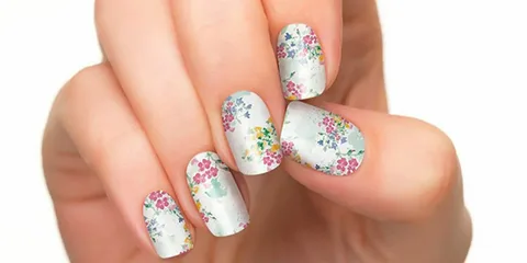 The 1990s brought about the nail sticker trend