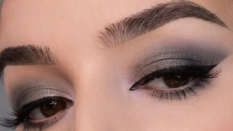 light eyeshadow and a simple winged eyeliner